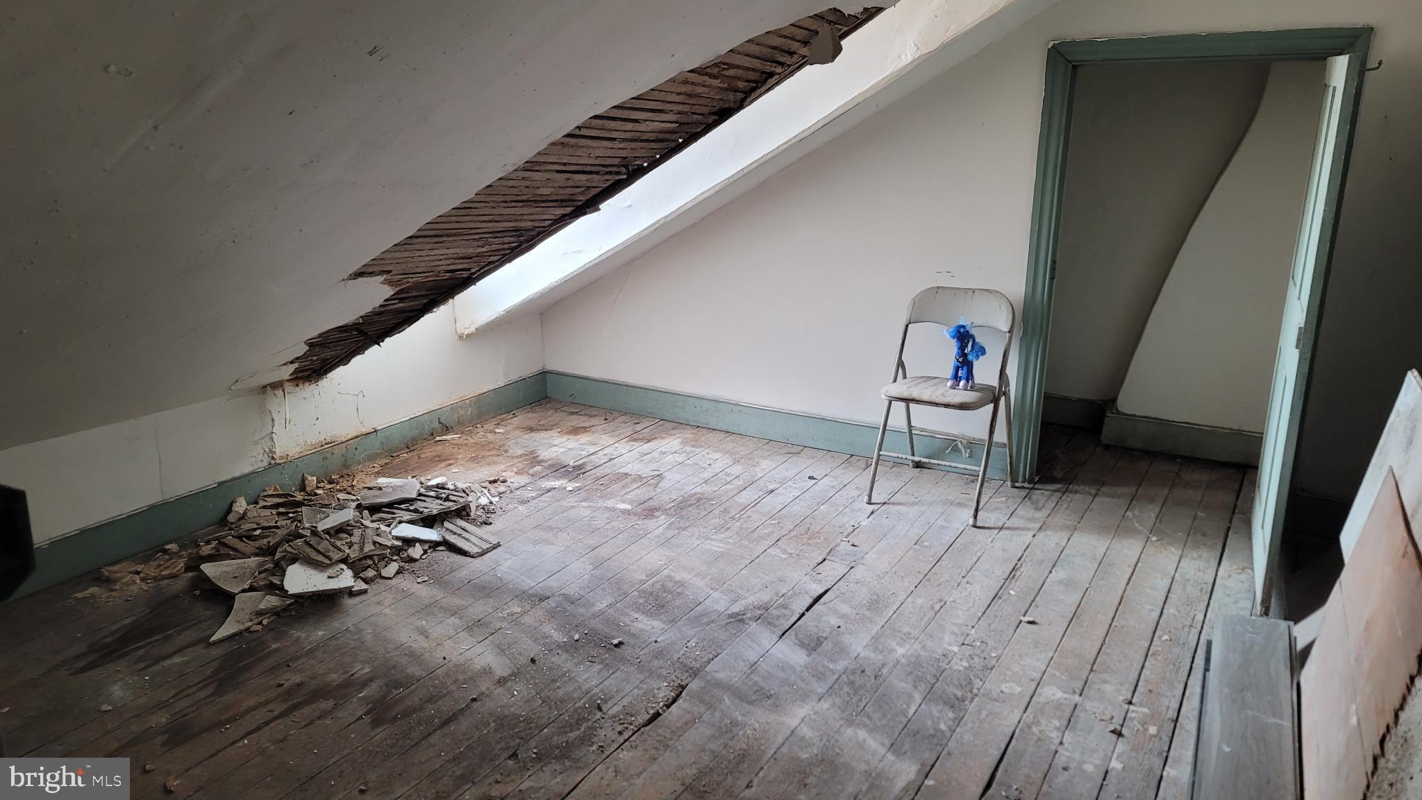 146 North 5th Street Reading, PA 19601 - Photo 47 of 53 a view of a hallway with wooden floor and stairs