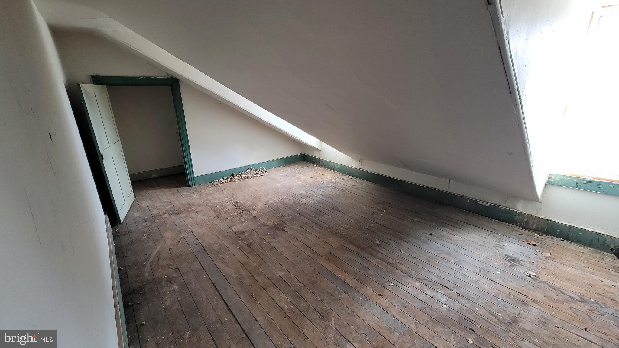 146 North 5th Street Reading, PA 19601 - Photo 48 of 53 a view of a hallway with wooden floor