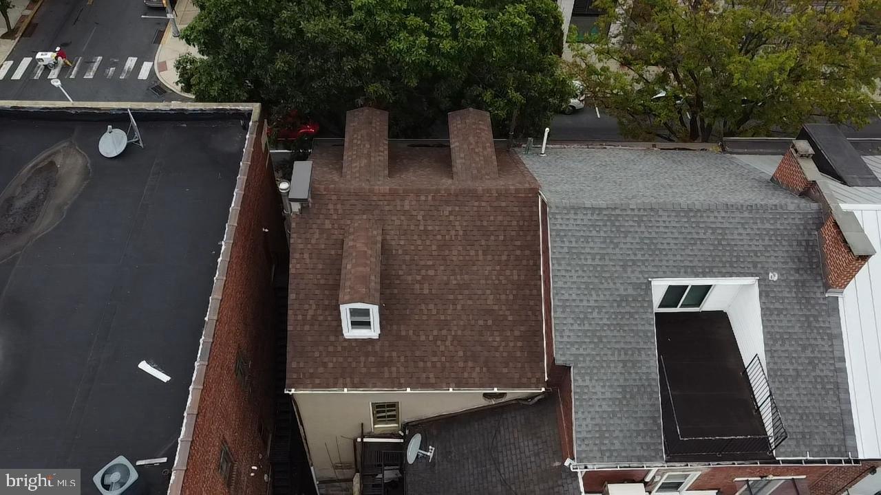 146 North 5th Street Reading, PA 19601 - Photo 53 of 53 a front view of a house with parking area