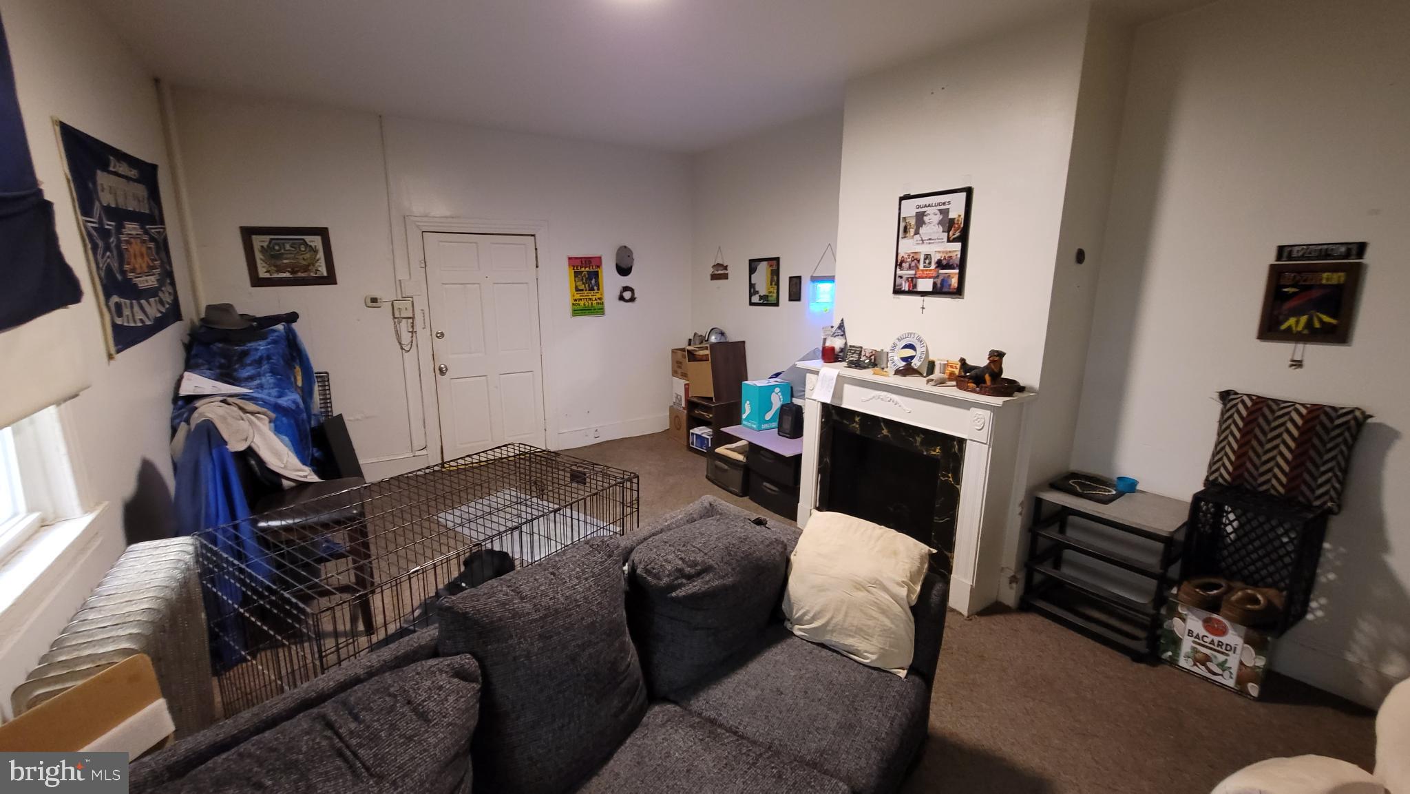 146 North 5th Street Reading, PA 19601 - Photo 9 of 53 a living room with furniture and a flat screen tv