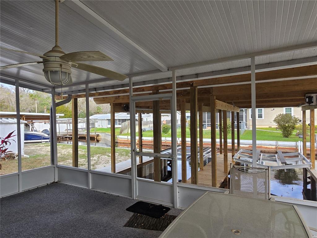 24521 Alligator Road Astor, FL 32102 - Photo 15 of 18 a view of a room with gym equipment