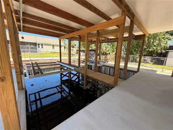 a view of a porch and garden