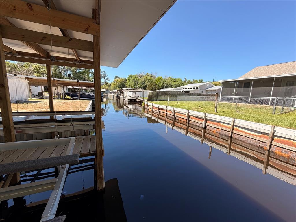24521 Alligator Road Astor, FL 32102 - Photo 21 of 24 a view of a balcony with outdoor space