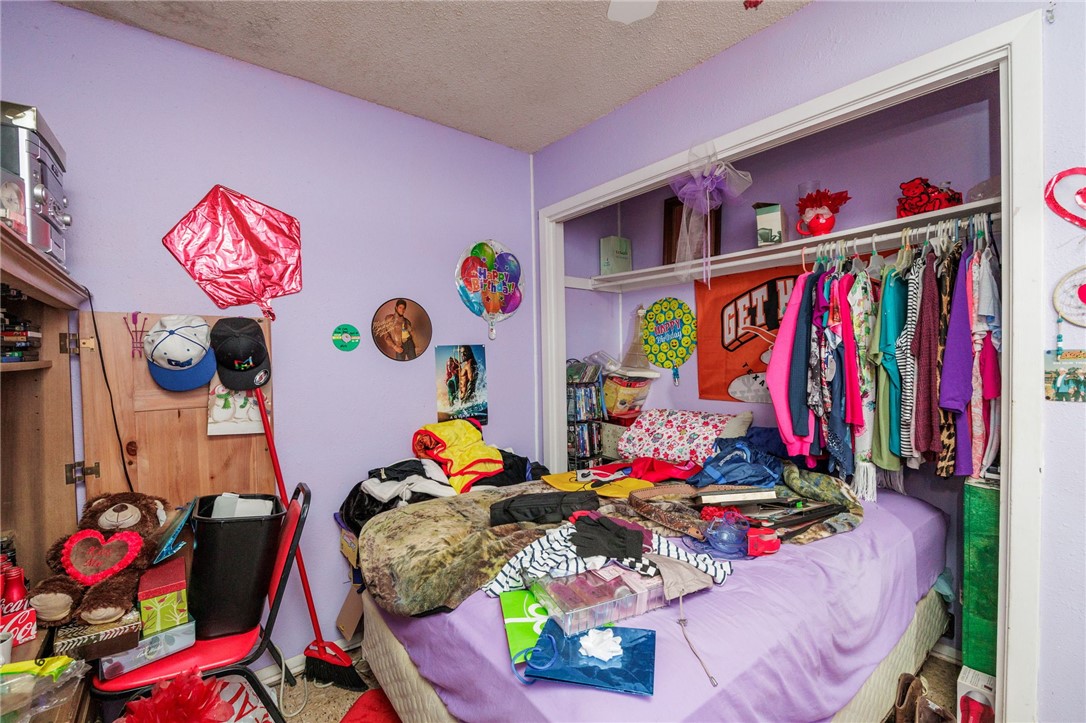 1007 Ross Street George West, TX 78022 - Photo 15 of 24 a view of kids room with toys and toys