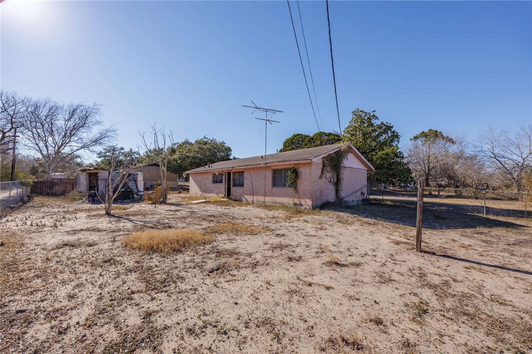 1007 Ross Street George West, TX 78022 - Photo 23 of 24 a view of a house with a yard