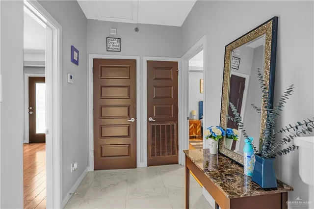 a view of staircase with white walls