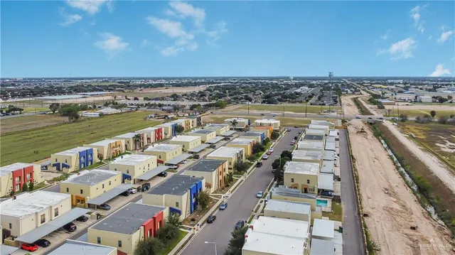 a picture of city view with lake view and houses