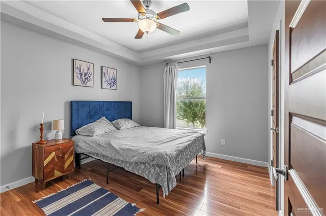 a view of a hallway to a livingroom with a furniture