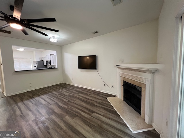2026 Austin Park Circle Decatur, GA 30032 - Photo 12 of 32 a view of a livingroom with wooden floor and a fireplace