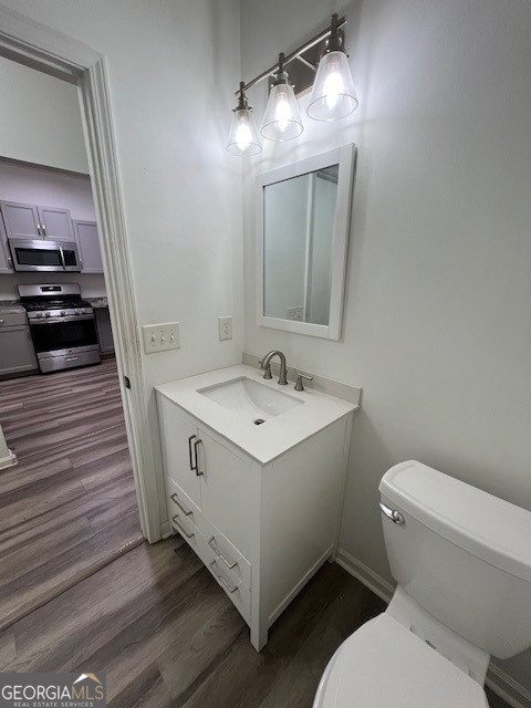 2026 Austin Park Circle Decatur, GA 30032 - Photo 19 of 32 a bathroom with a sink and a mirror