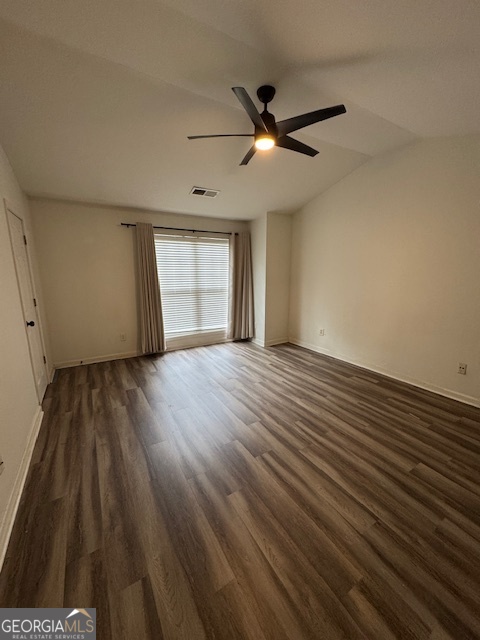 2026 Austin Park Circle Decatur, GA 30032 - Photo 21 of 32 wooden floor in an empty room with a window