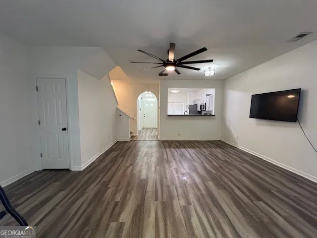 a view of a livingroom with wooden floor