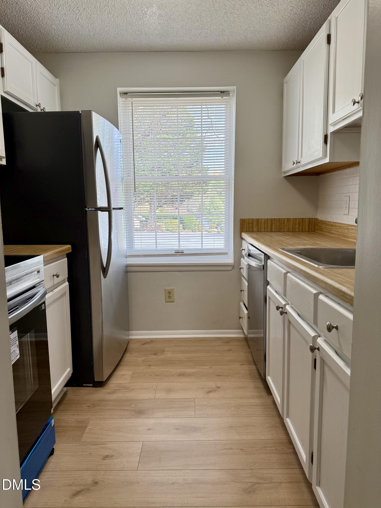 7721 Kingsberry Court Raleigh, NC 27615 - Photo 4 of 25 IMG_8153