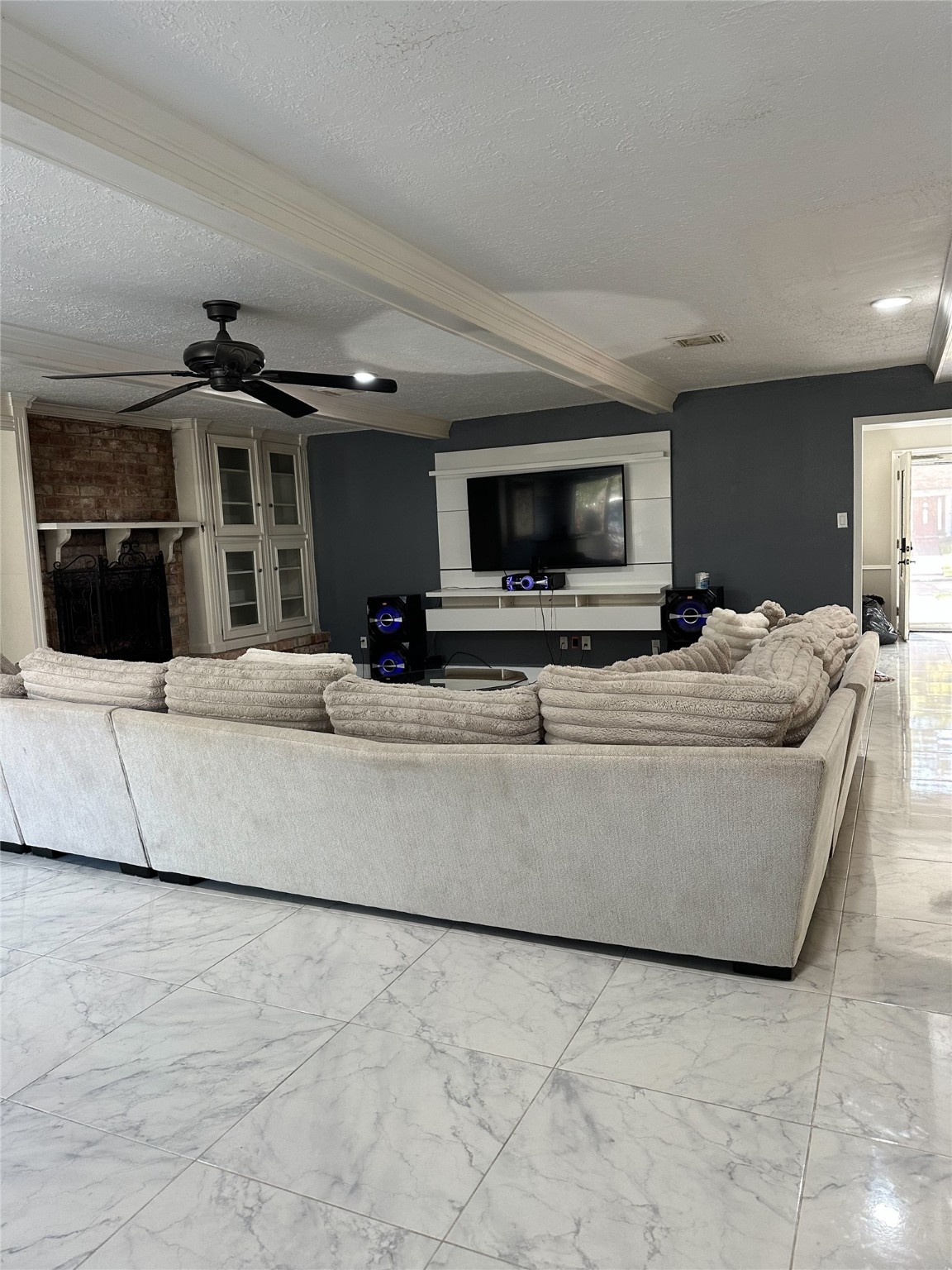 1011 Whitestone Lane Houston, TX 77073 - Photo 11 of 32 a living room with furniture and a flat screen tv