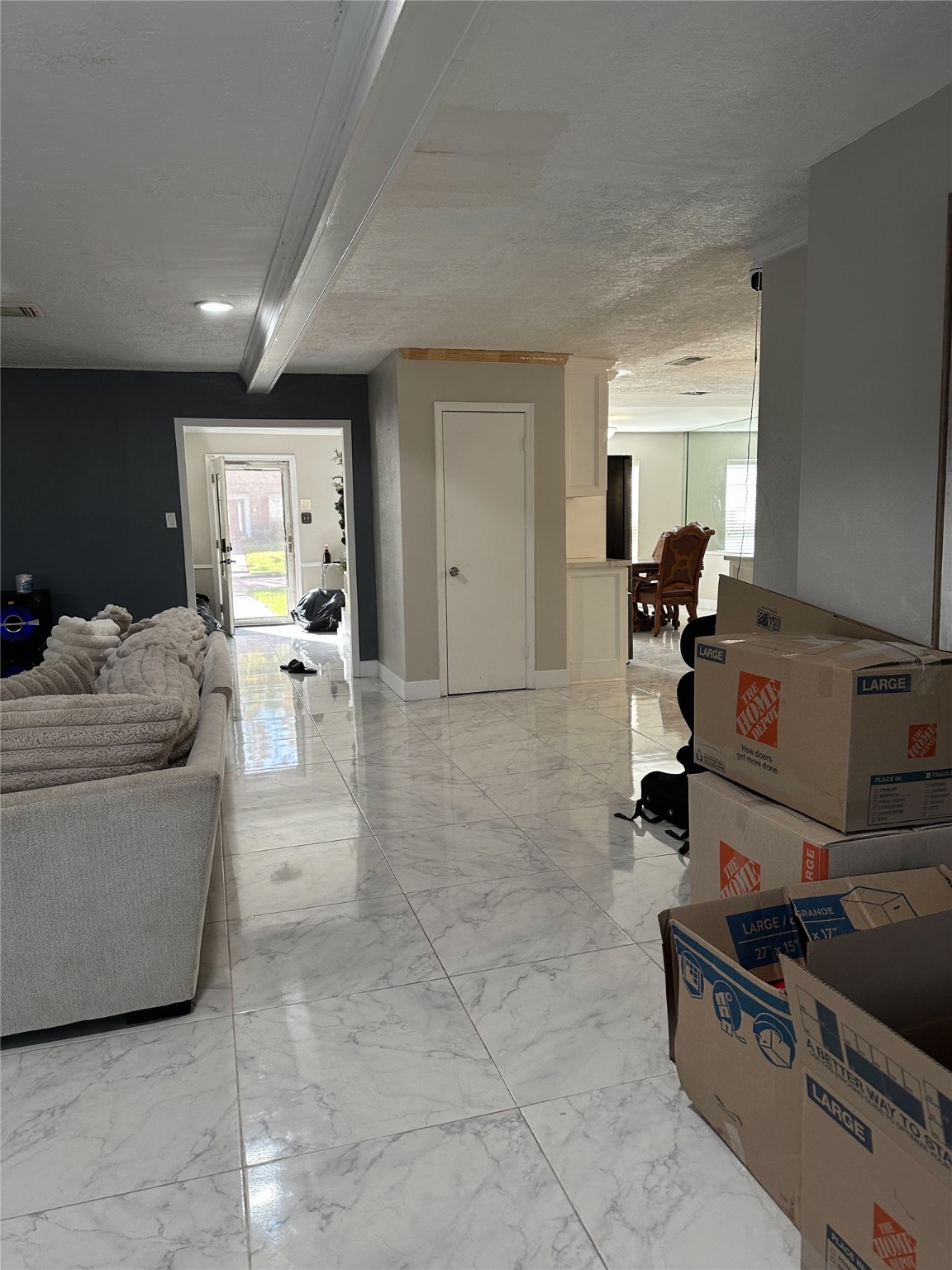 1011 Whitestone Lane Houston, TX 77073 - Photo 12 of 32 a living room with furniture and a table