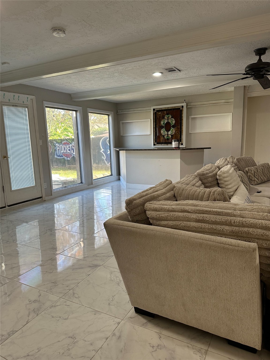 1011 Whitestone Lane Houston, TX 77073 - Photo 13 of 32 a living room with furniture and a large window