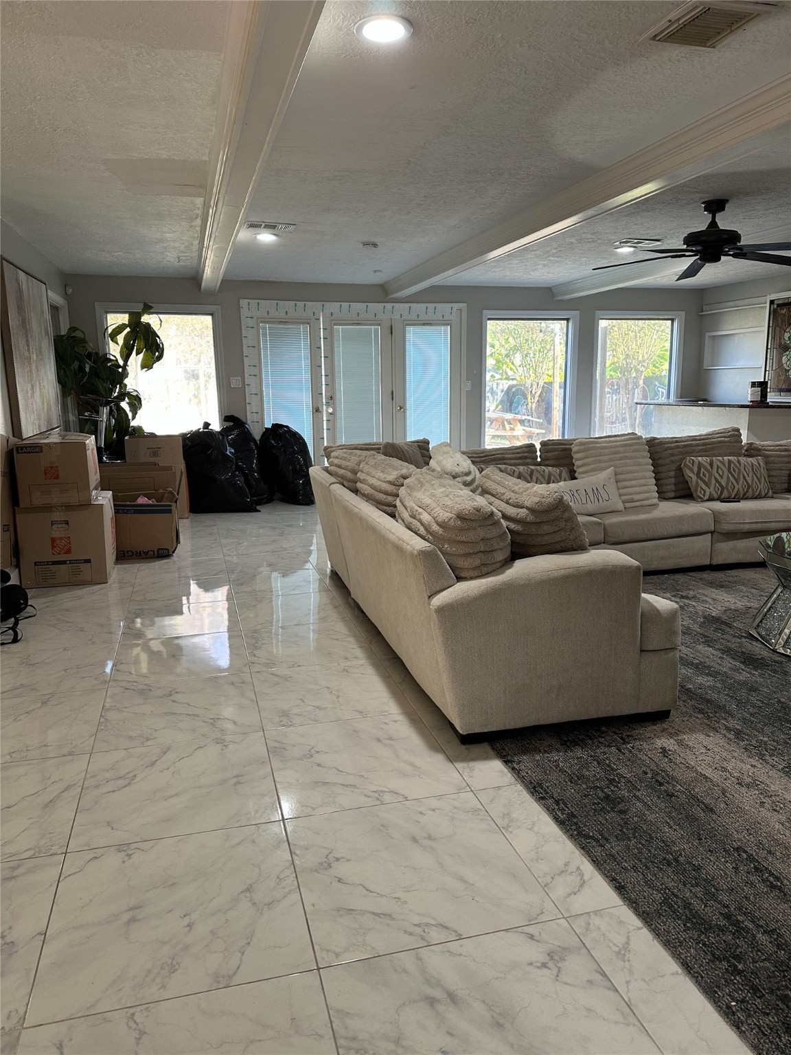 1011 Whitestone Lane Houston, TX 77073 - Photo 14 of 32 a living room with furniture and a large window