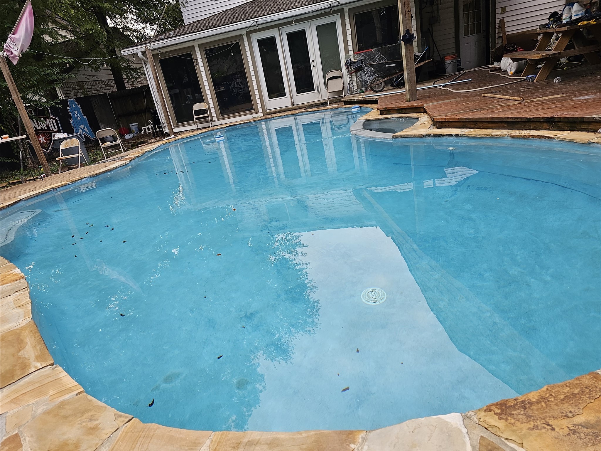 1011 Whitestone Lane Houston, TX 77073 - Photo 2 of 32 a view of a swimming pool with an outdoor seating