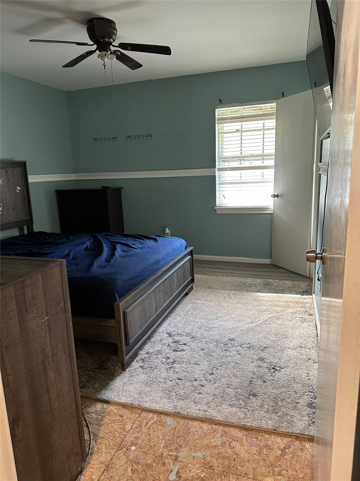 1011 Whitestone Lane Houston, TX 77073 - Photo 23 of 32 a bedroom with a bed and window