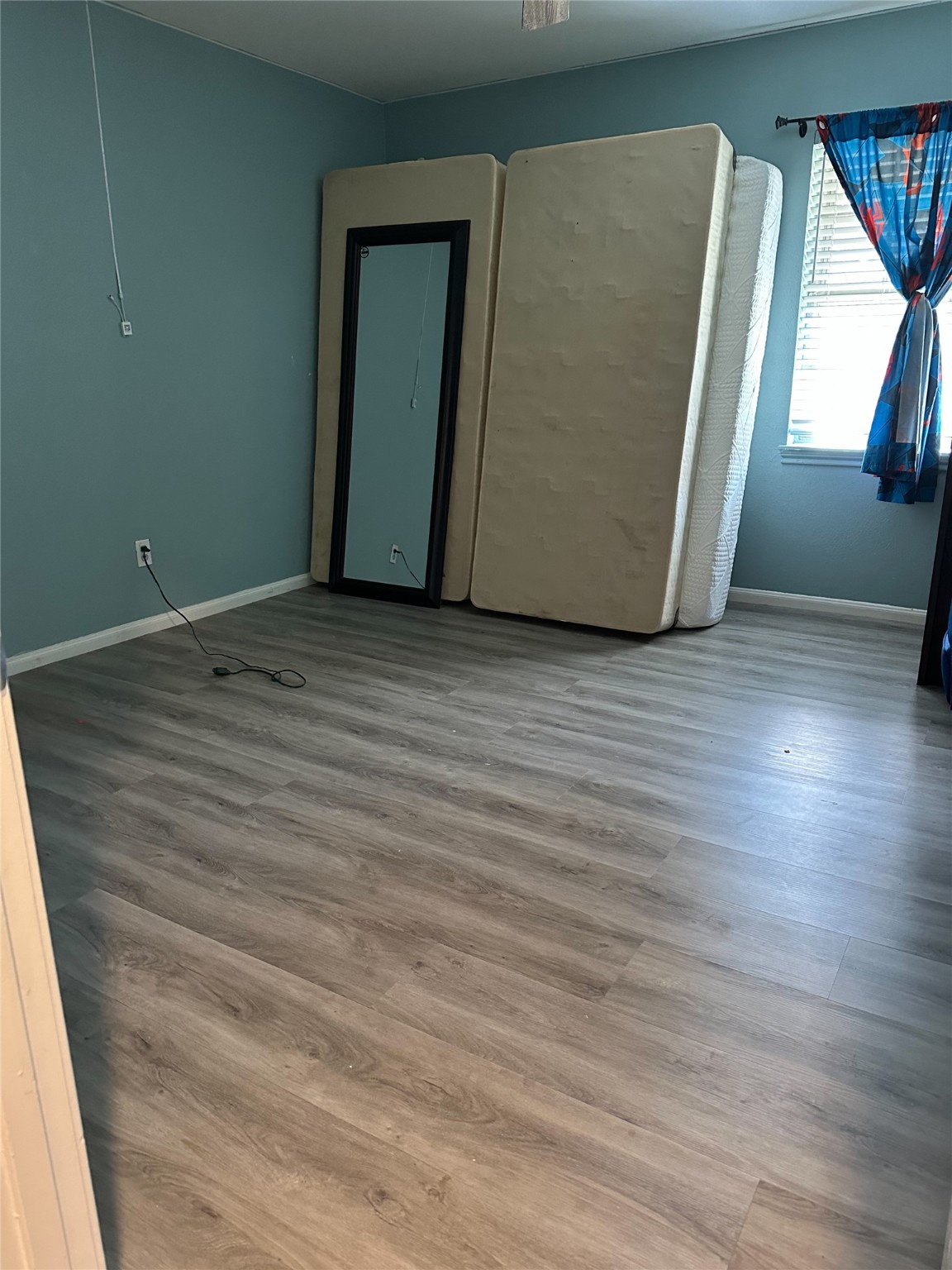 1011 Whitestone Lane Houston, TX 77073 - Photo 24 of 32 a view of a room with wooden floor and cabinet