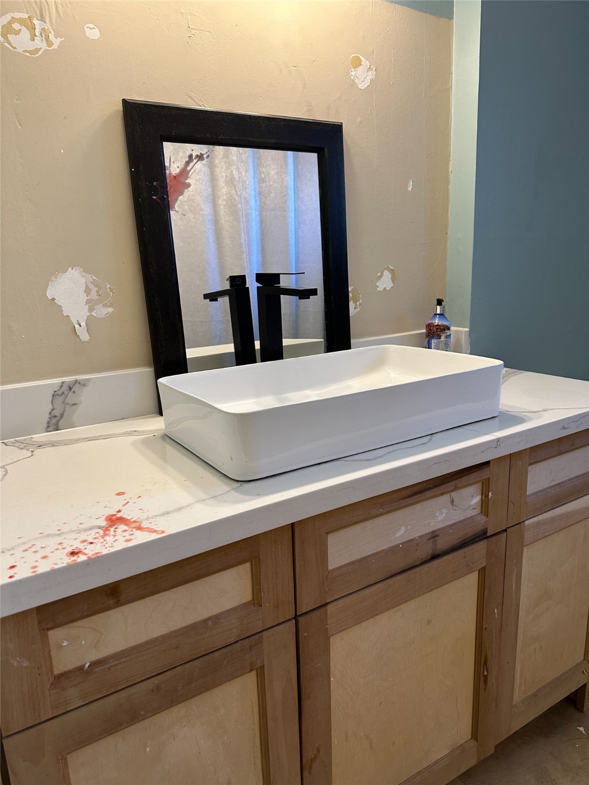 1011 Whitestone Lane Houston, TX 77073 - Photo 25 of 32 a bathroom with a sink and a mirror