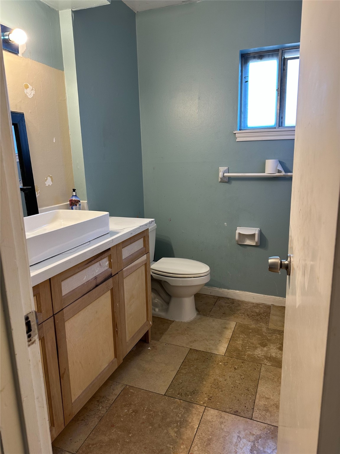 1011 Whitestone Lane Houston, TX 77073 - Photo 26 of 32 a bathroom with a sink a toilet and a mirror