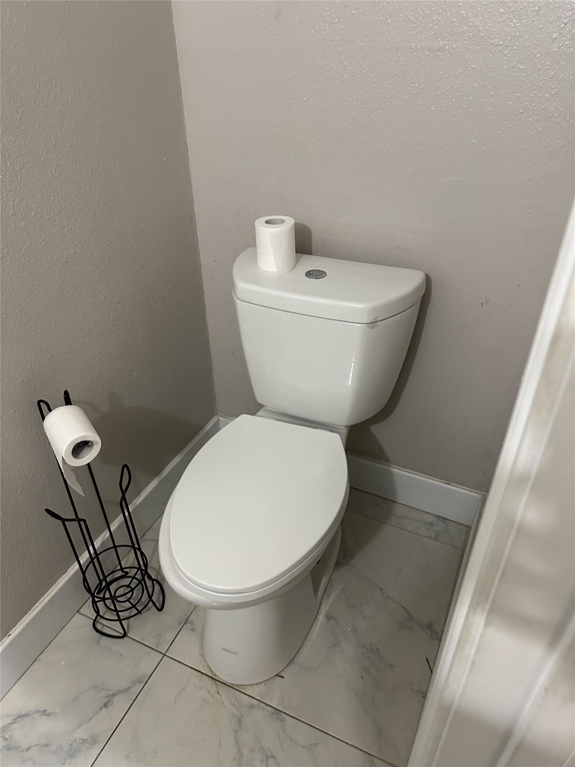 1011 Whitestone Lane Houston, TX 77073 - Photo 30 of 32 a bathroom with a toilet and a sink