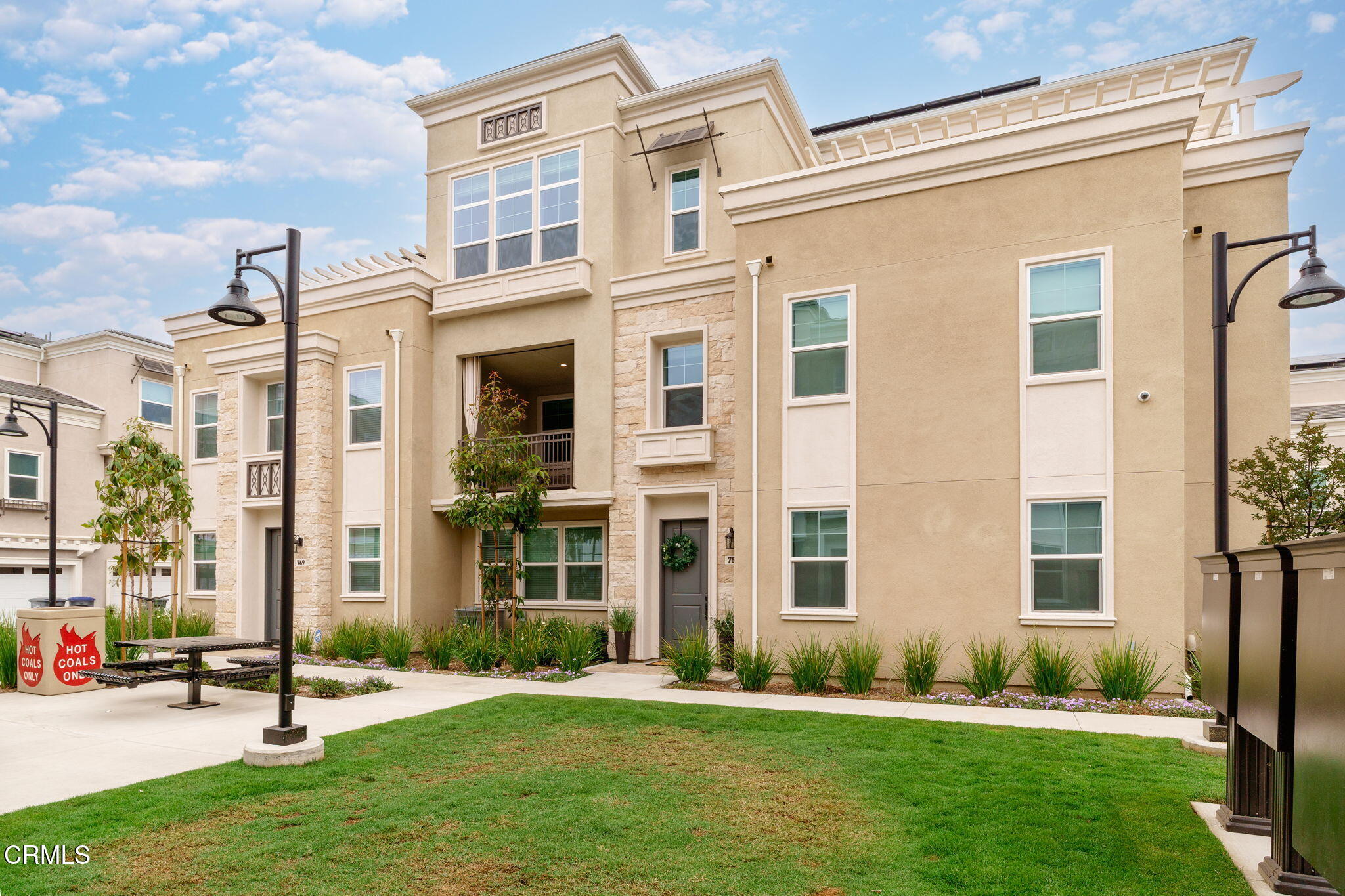 751 Winchester Drive Oxnard, CA 93036 - Photo 1 of 33 front view of a building with a yard