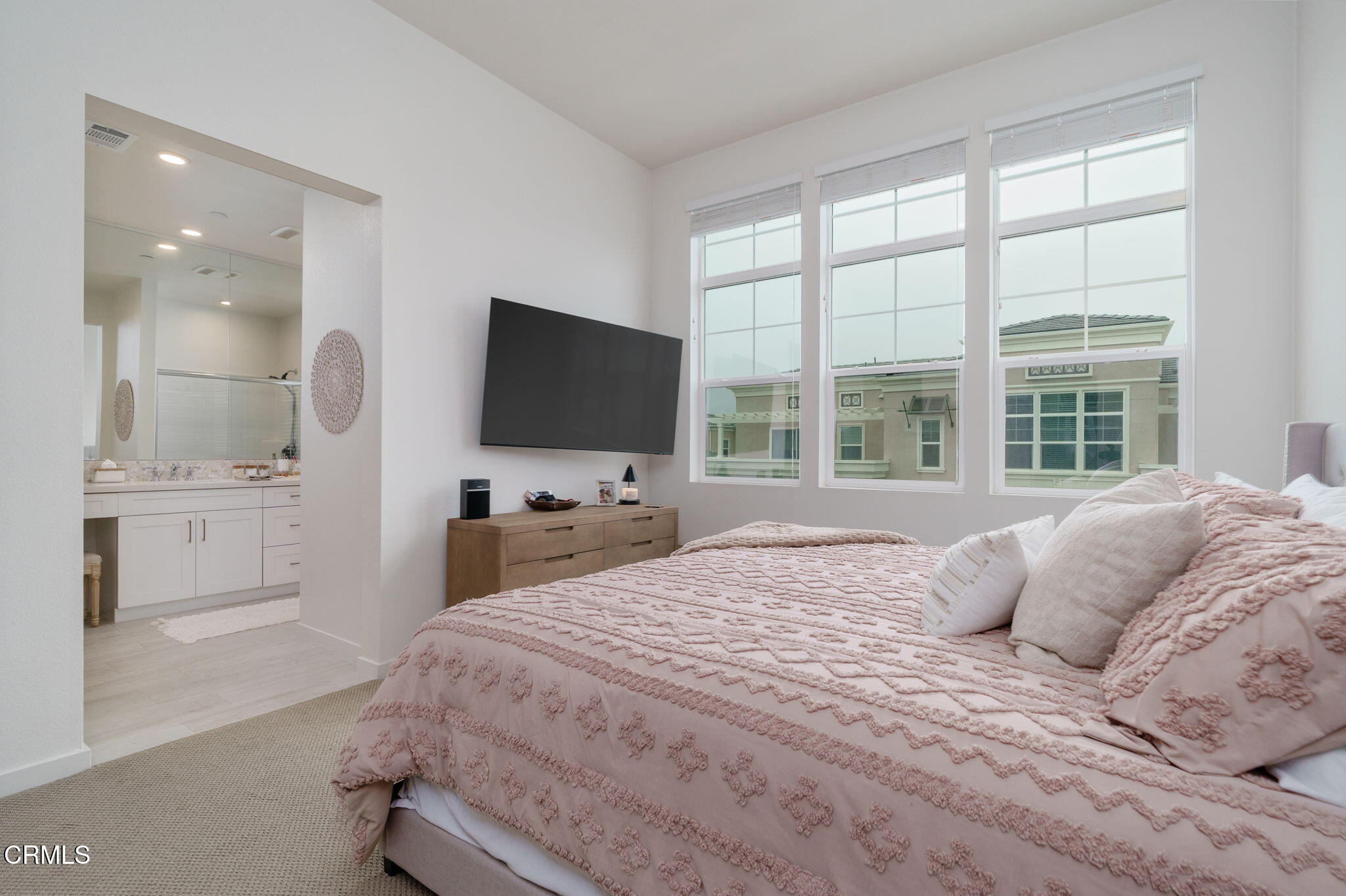 751 Winchester Drive Oxnard, CA 93036 - Photo 21 of 33 a bedroom with a bed and a flat screen tv