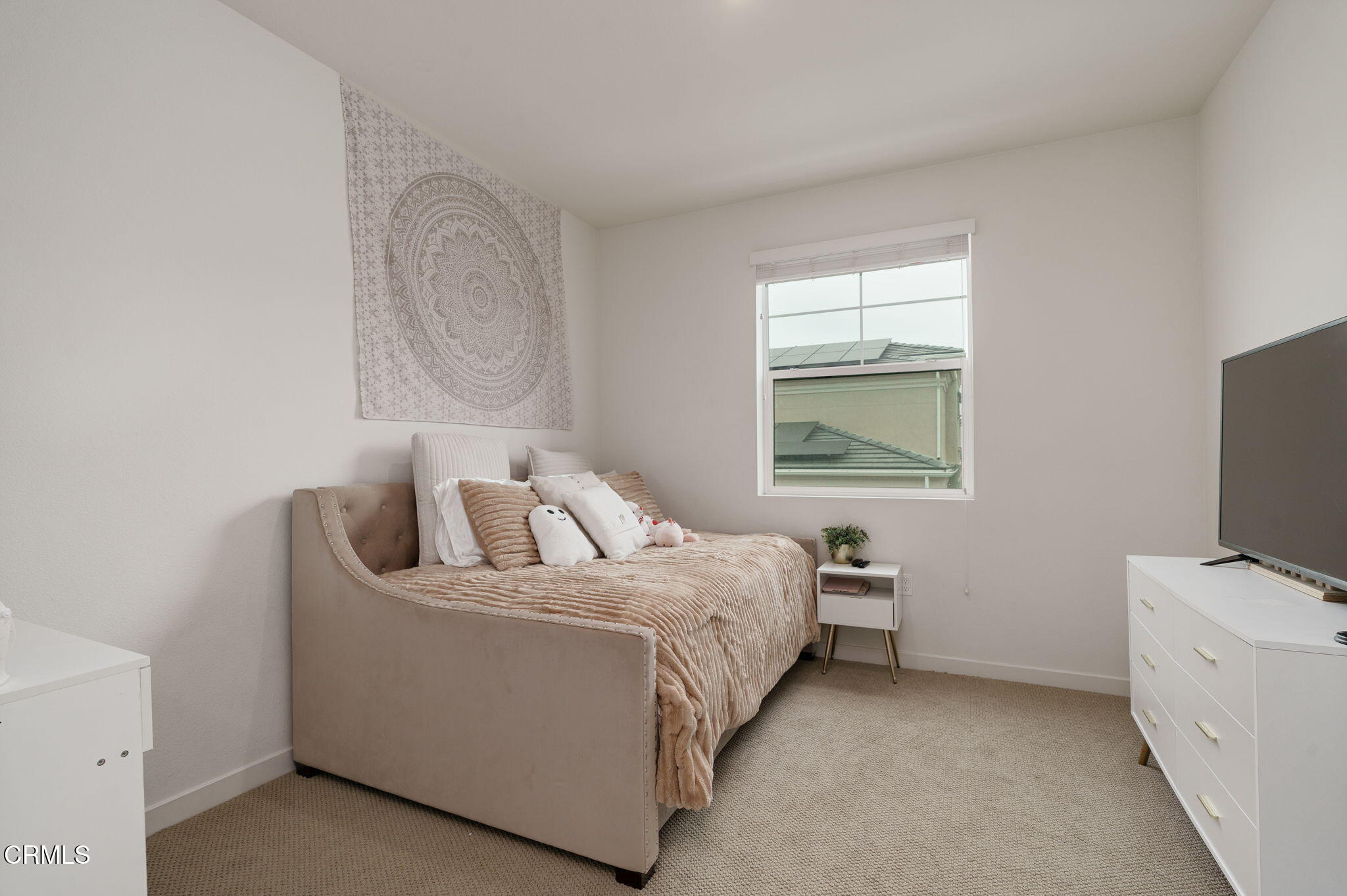 751 Winchester Drive Oxnard, CA 93036 - Photo 24 of 33 a bed room with a bed and a tv