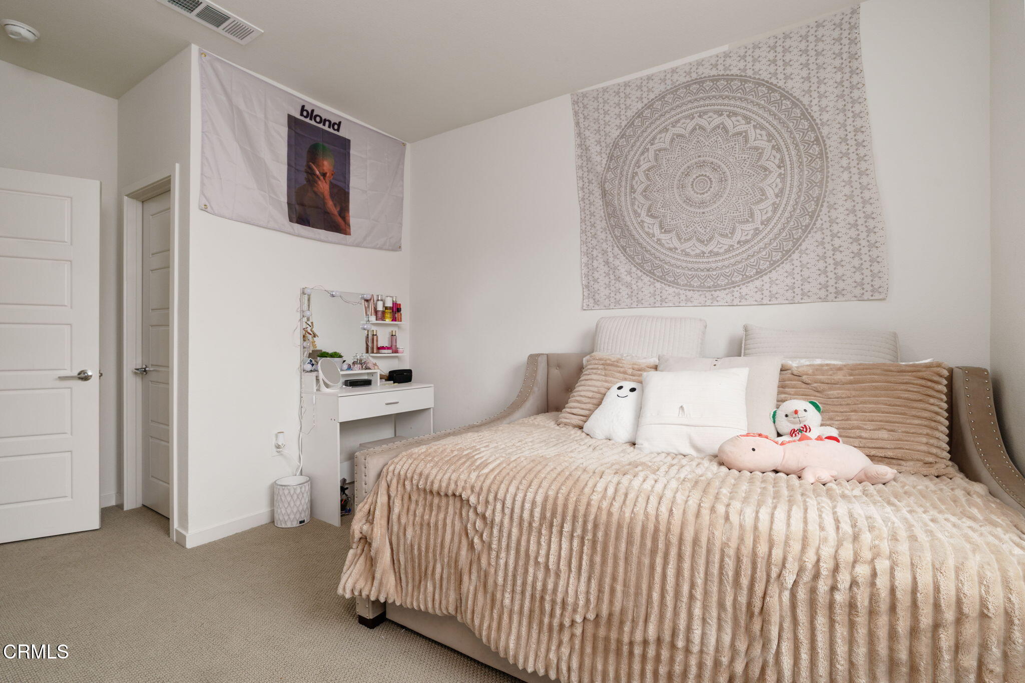 751 Winchester Drive Oxnard, CA 93036 - Photo 25 of 33 a bedroom with a bed and a lamp on dresser