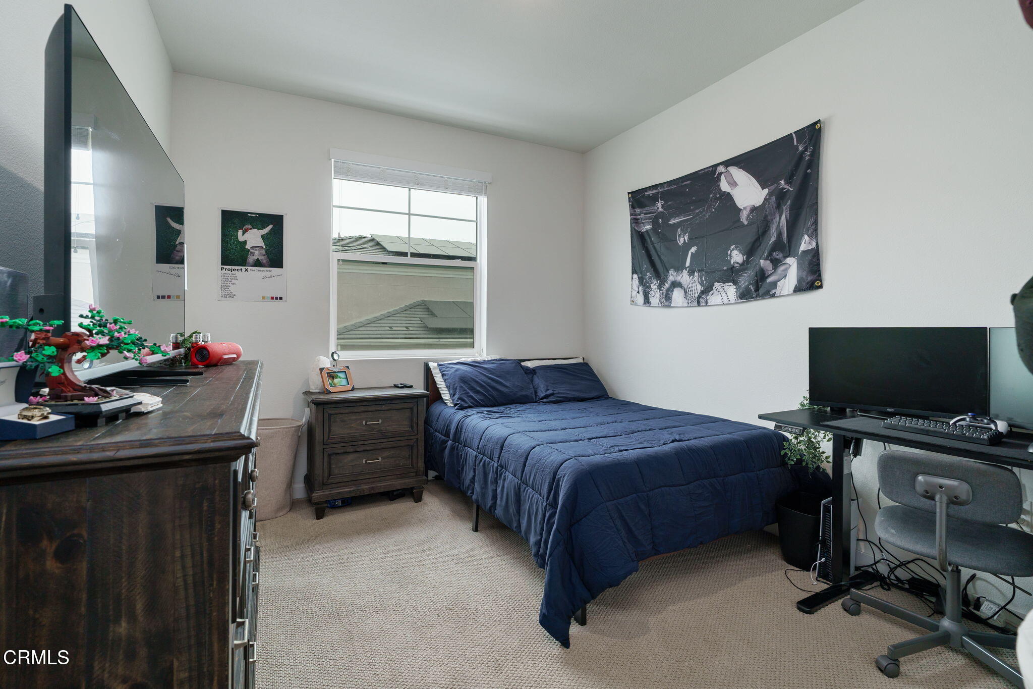 751 Winchester Drive Oxnard, CA 93036 - Photo 26 of 33 a bedroom with a bed and a flat screen tv