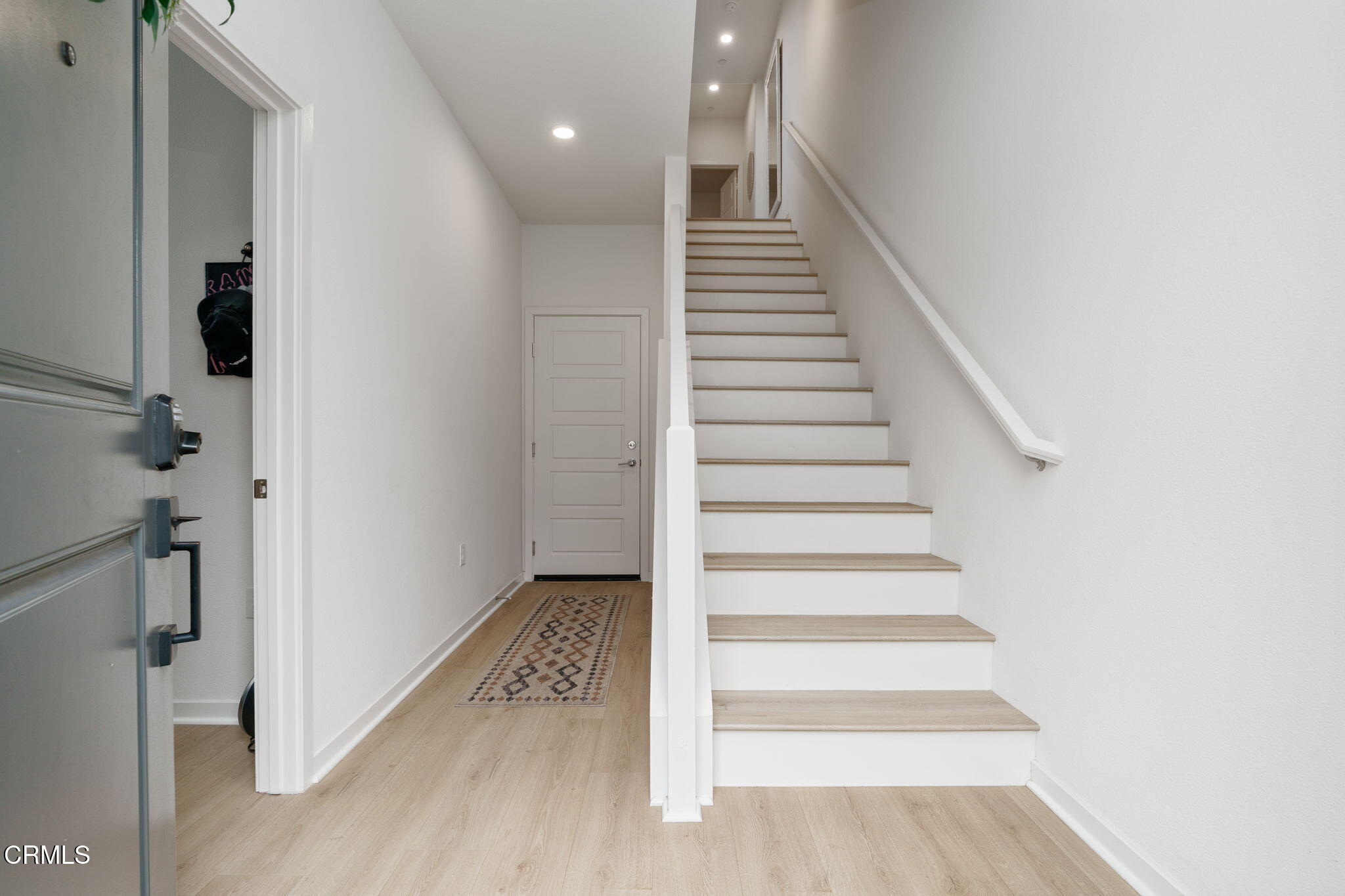 751 Winchester Drive Oxnard, CA 93036 - Photo 3 of 33 a view of entryway and hall with wooden floor