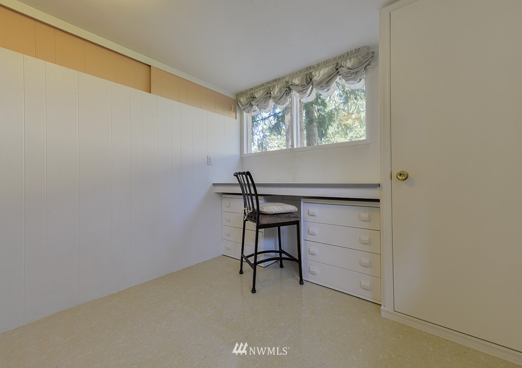 15256 Southeast 116th Street Renton, WA 98059 - Photo 16 of 38 a view of room with windows and furniture