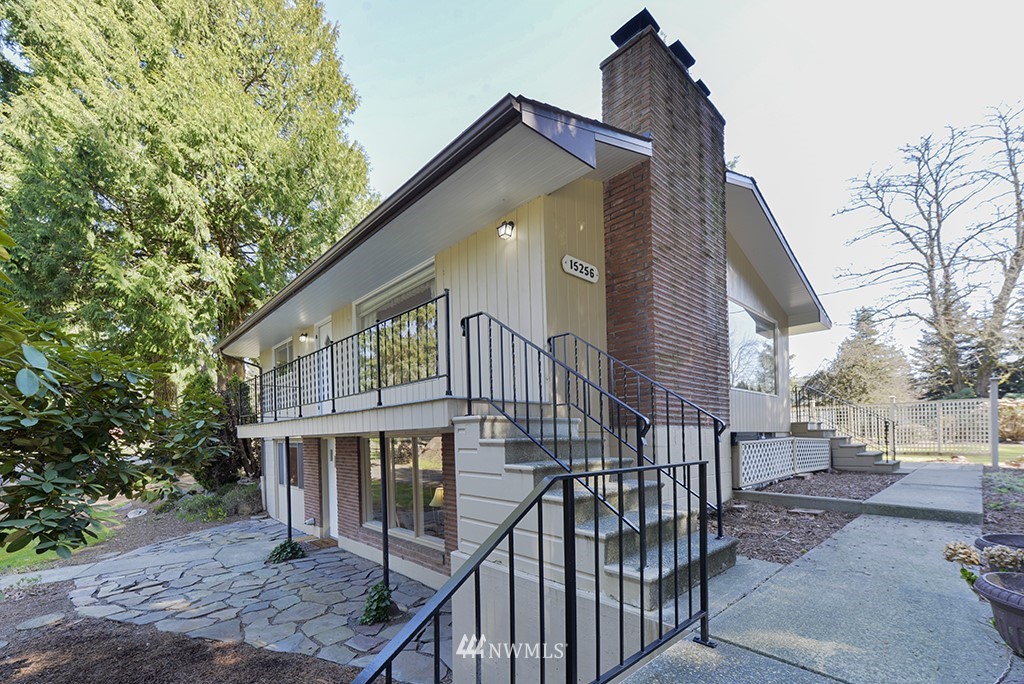 15256 Southeast 116th Street Renton, WA 98059 - Photo 21 of 38 a view of a house with iron fence