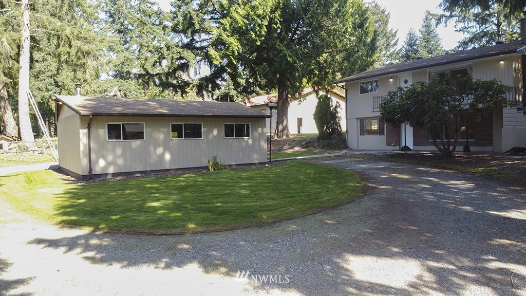 15256 Southeast 116th Street Renton, WA 98059 - Photo 35 of 38 a front view of house with yard