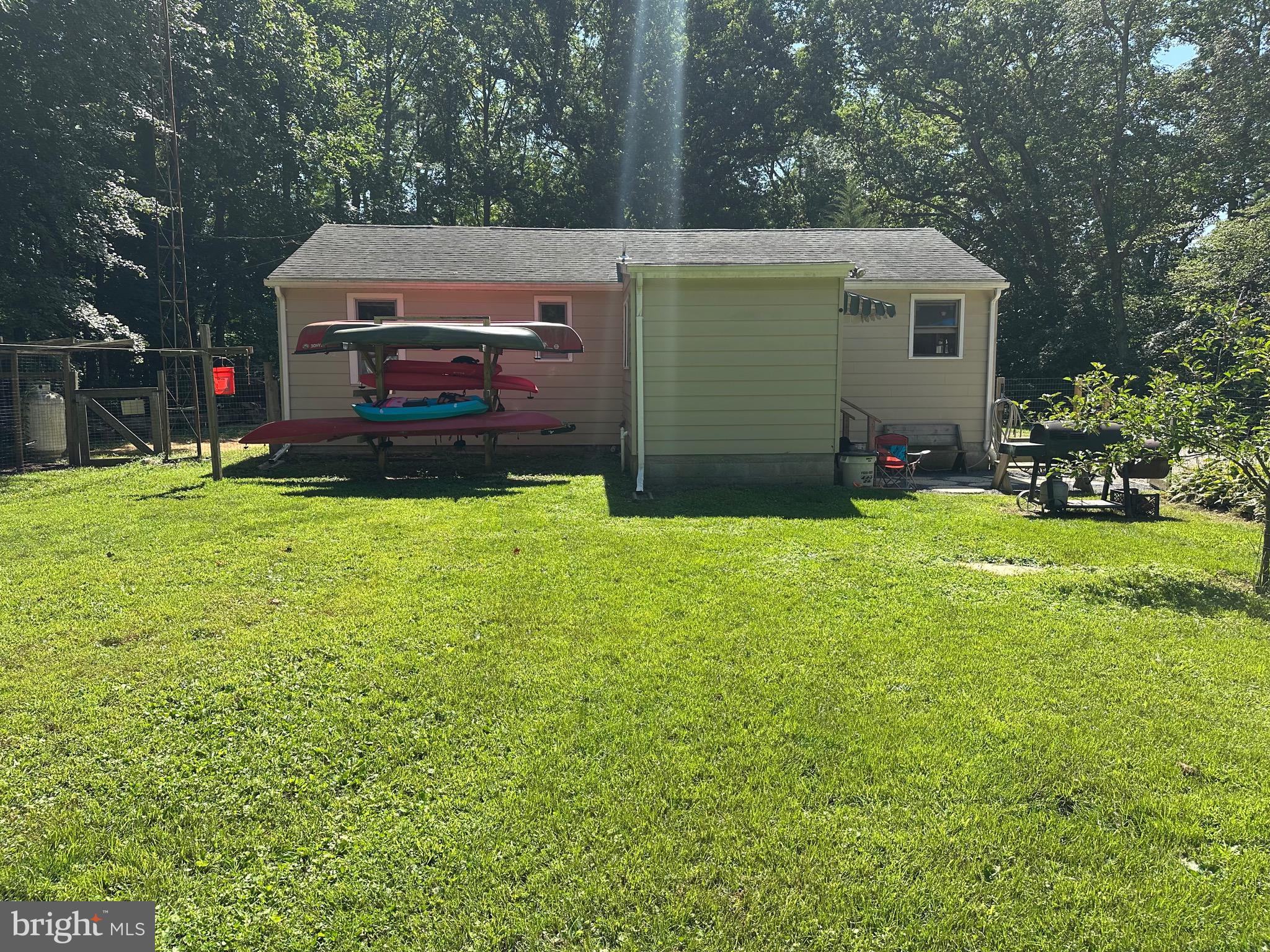 550 Quinton-Marlboro Road Bridgeton, NJ 08302 - Photo 15 of 30 a view of a house with a yard and sitting area