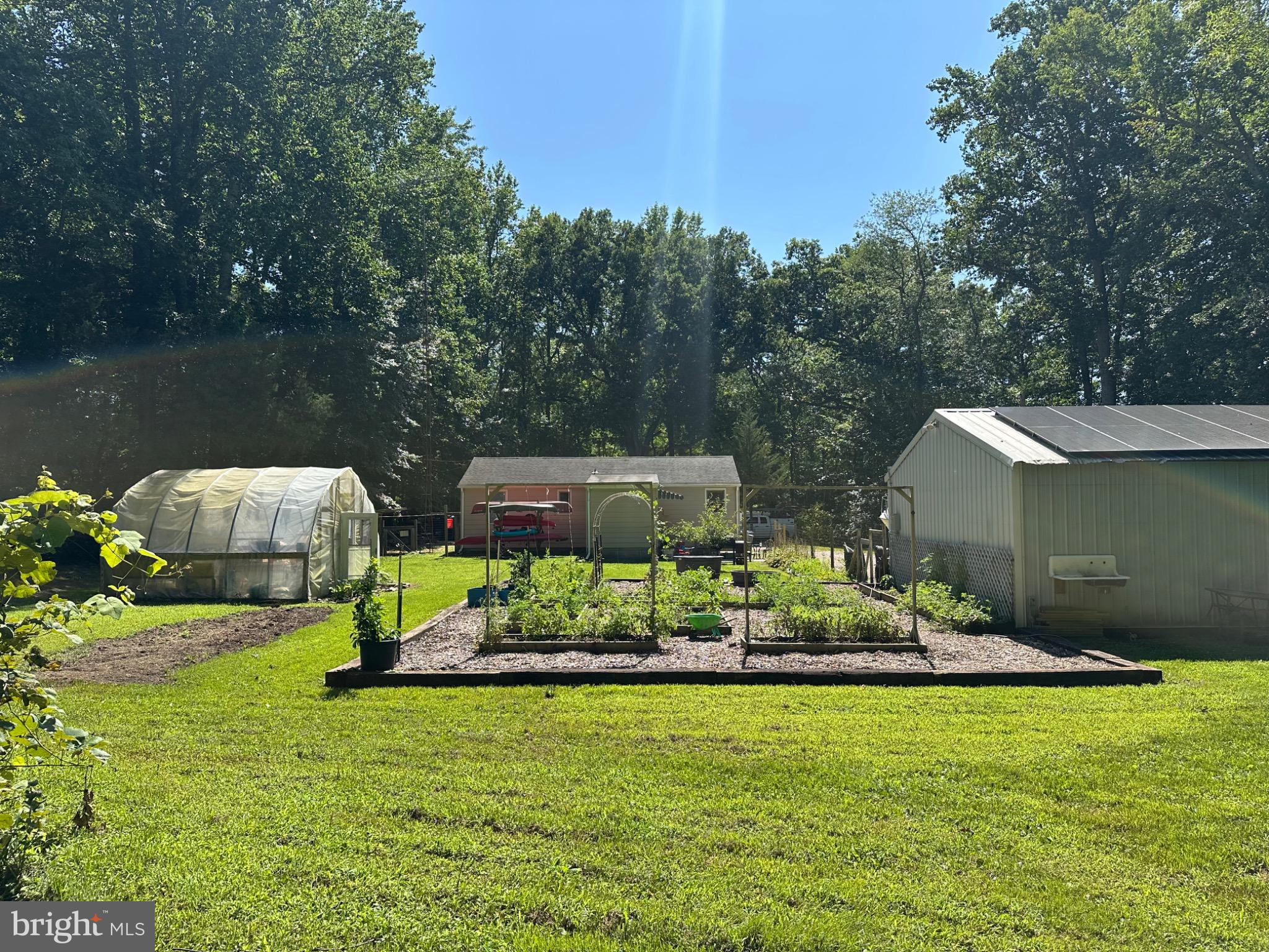 550 Quinton-Marlboro Road Bridgeton, NJ 08302 - Photo 16 of 30 a front view of a house with garden