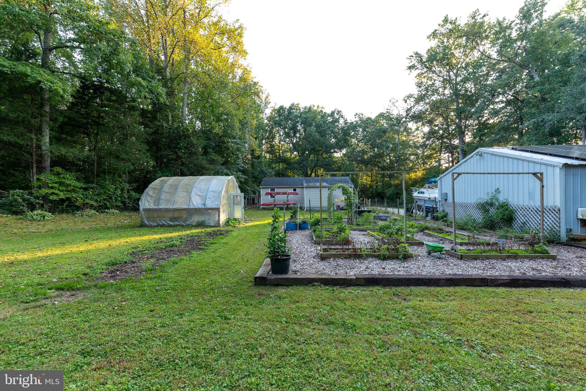 550 Quinton-Marlboro Road Bridgeton, NJ 08302 - Photo 21 of 30 a house view with a garden space