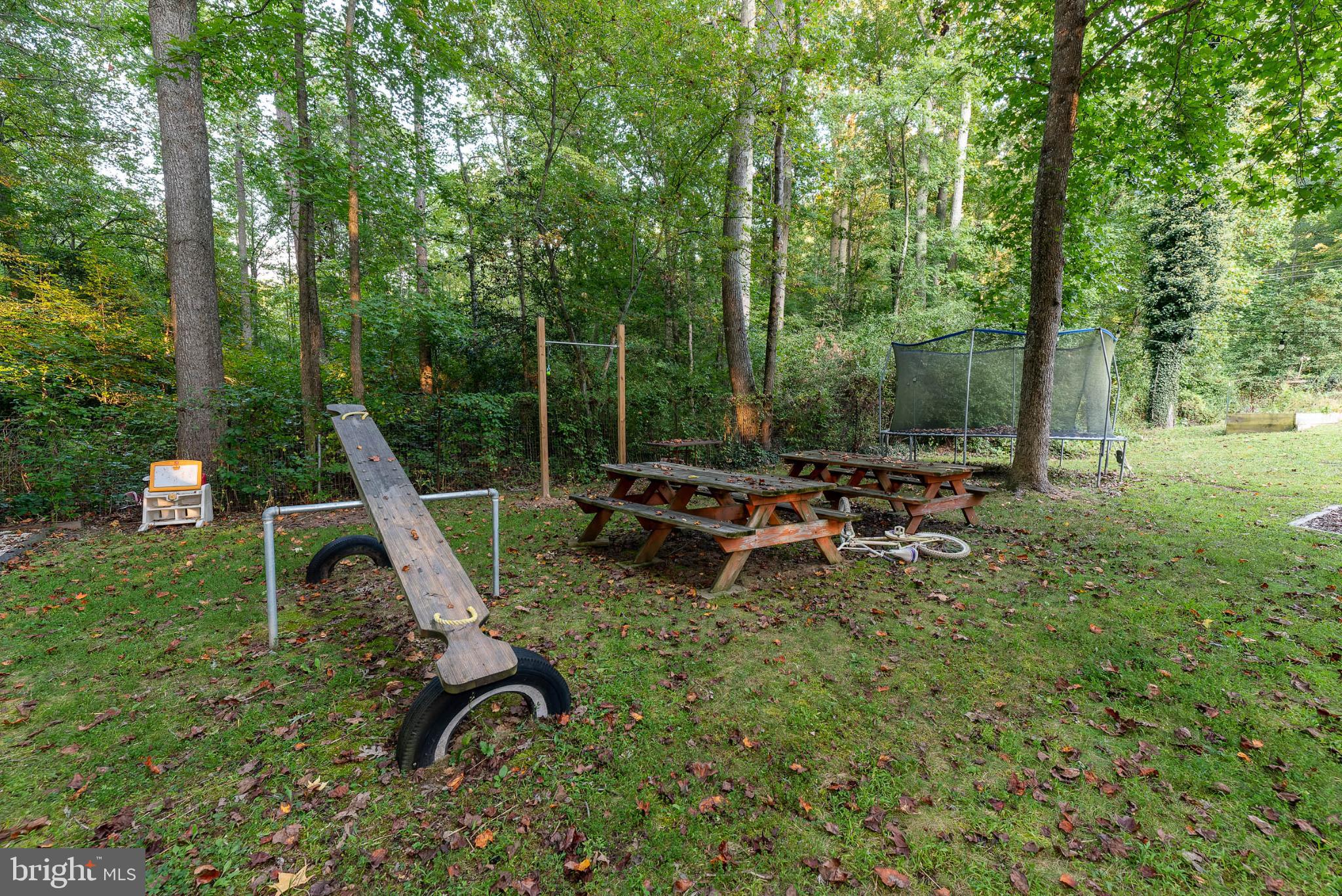 550 Quinton-Marlboro Road Bridgeton, NJ 08302 - Photo 25 of 30 a view of a backyard with a sitting area and slide