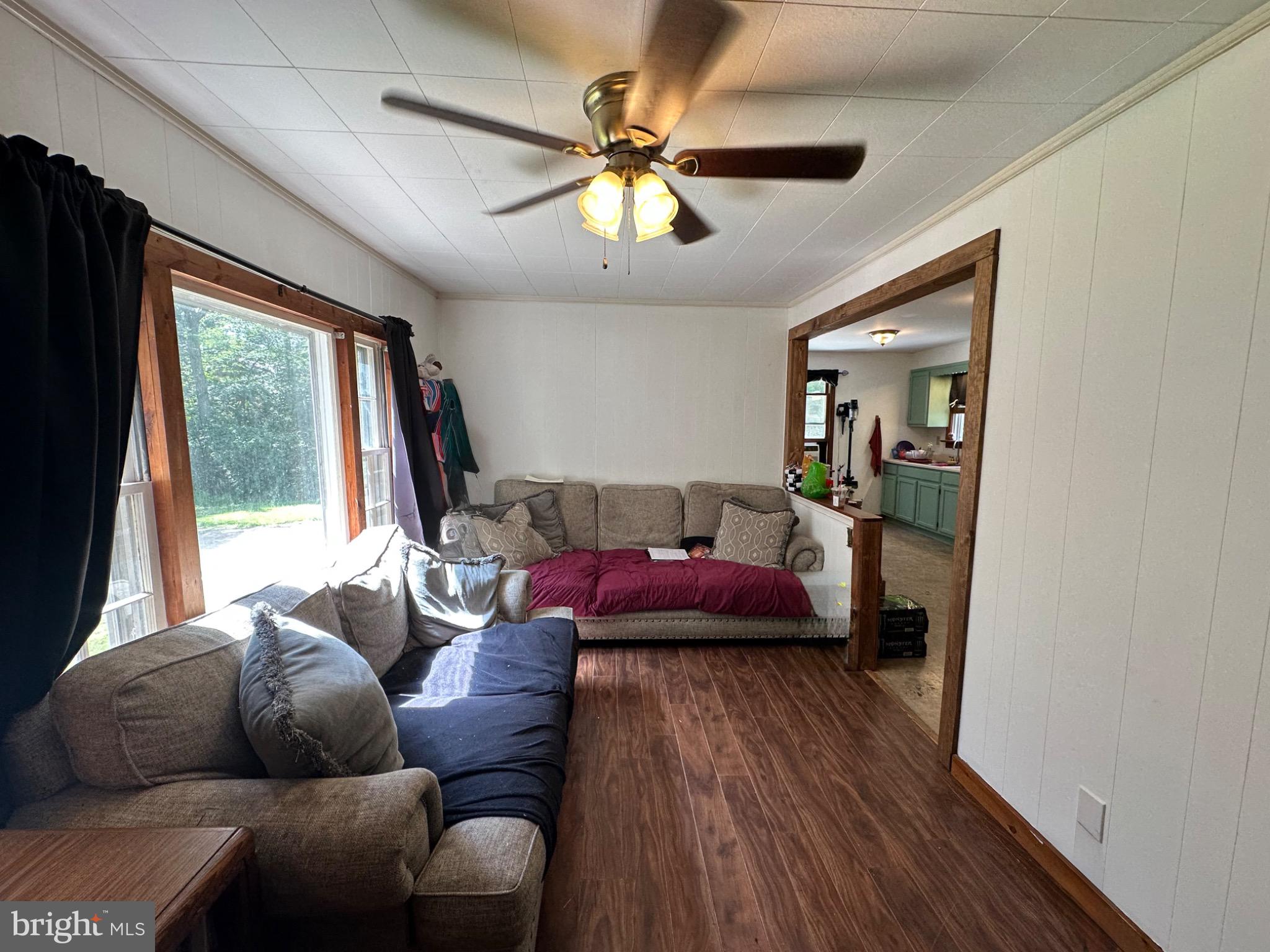 550 Quinton-Marlboro Road Bridgeton, NJ 08302 - Photo 5 of 30 a living room with furniture and a large window