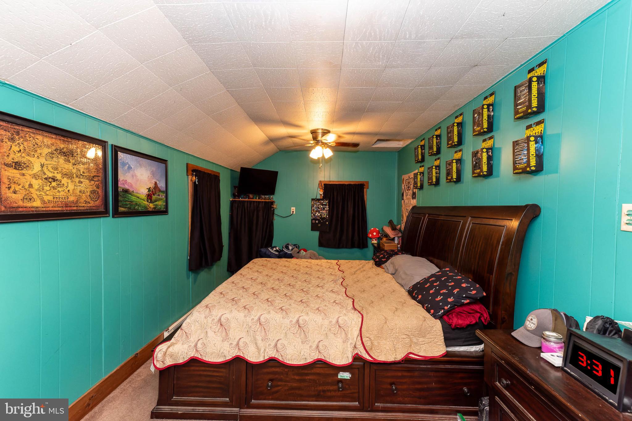 550 Quinton-Marlboro Road Bridgeton, NJ 08302 - Photo 9 of 30 a bed room with a bed mirror and a window