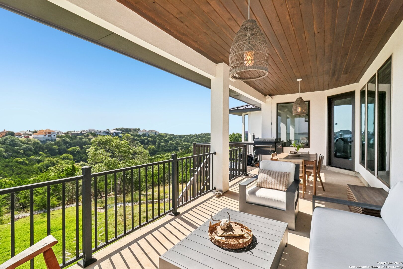 517 Preston Trail Boerne, TX 78006 - Photo 2 of 40 a balcony with furniture and a potted plant