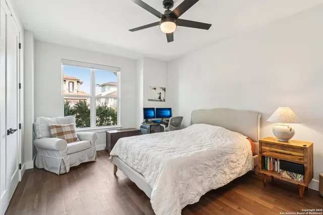 a bedroom with a bed and a couch