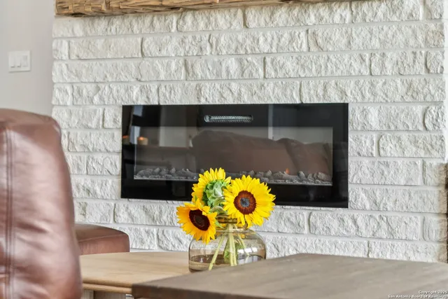 a living room with a fireplace