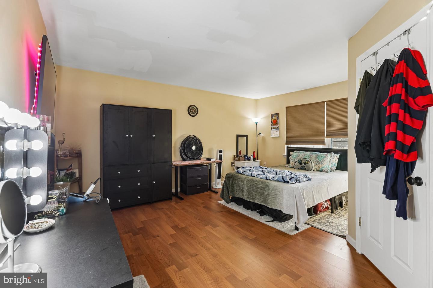 1160 Sawmill Road Brick, NJ 08724 - Photo 15 of 24 a bedroom with a bed and a mirror on the dresser