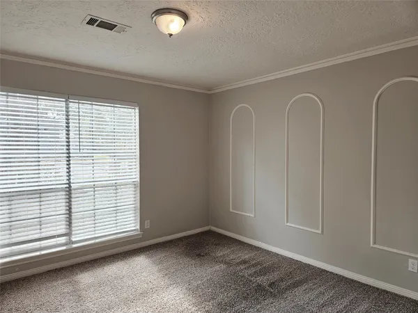 a view of a livingroom with an entryway