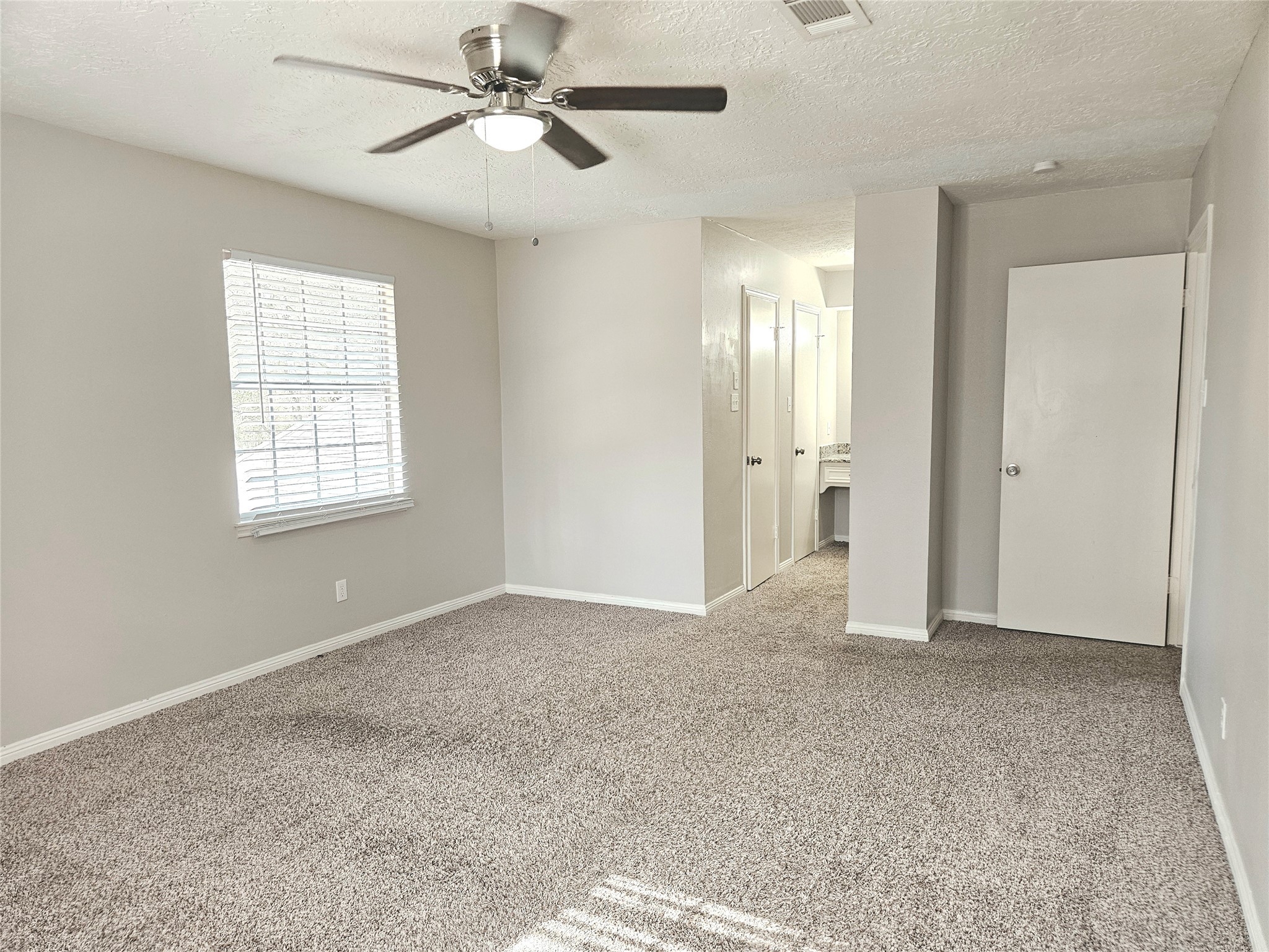 6126 Inway Drive Spring, TX 77389 - Photo 19 of 27 a view of an empty room with a window