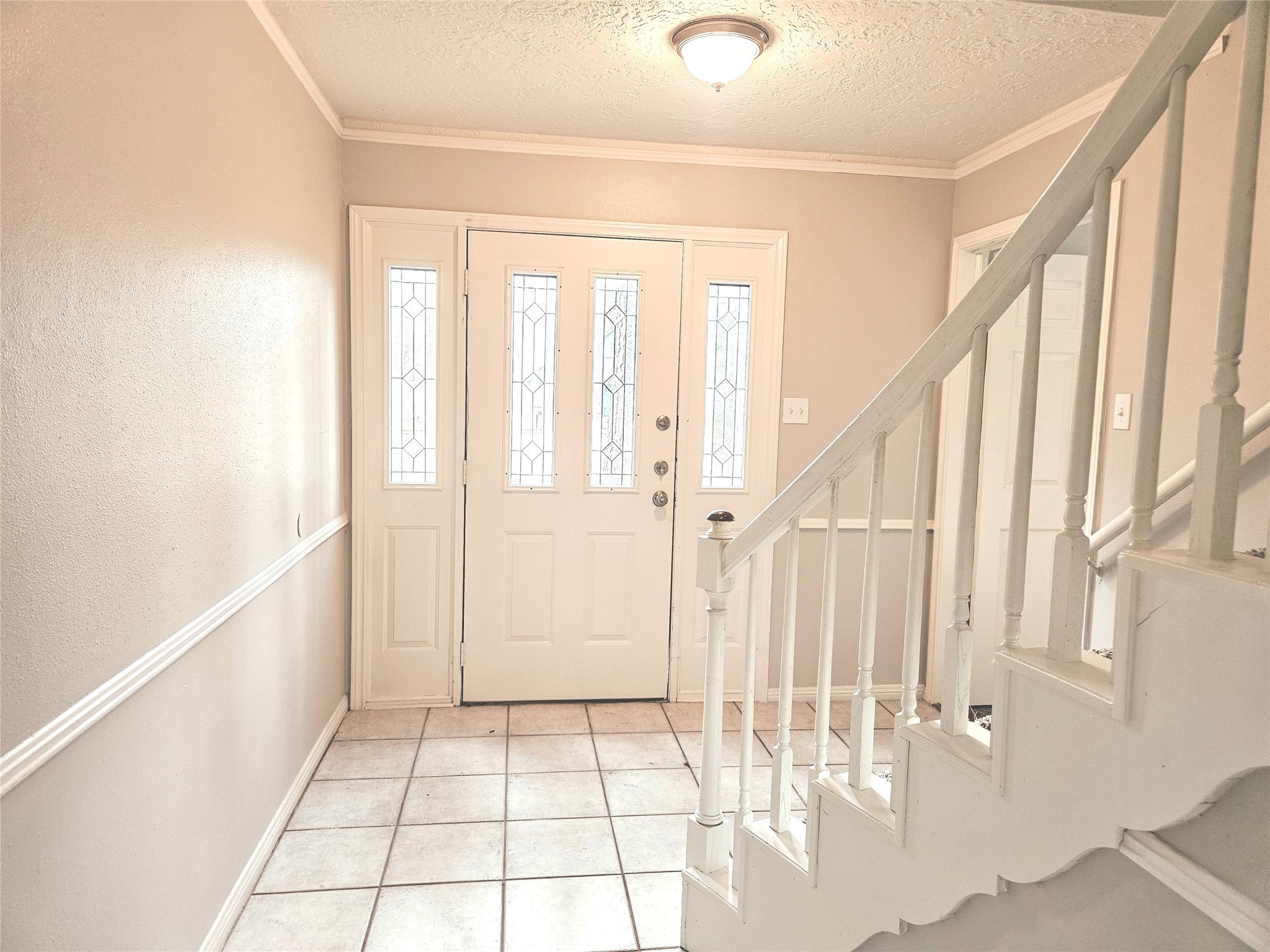 6126 Inway Drive Spring, TX 77389 - Photo 2 of 27 a view of an entryway with staircase