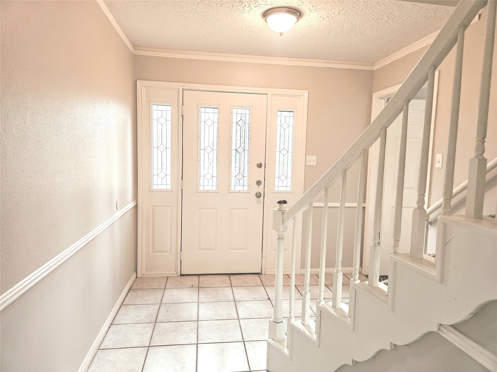 6126 Inway Drive Spring, TX 77389 - Photo 2 of 27 a view of an entryway with staircase